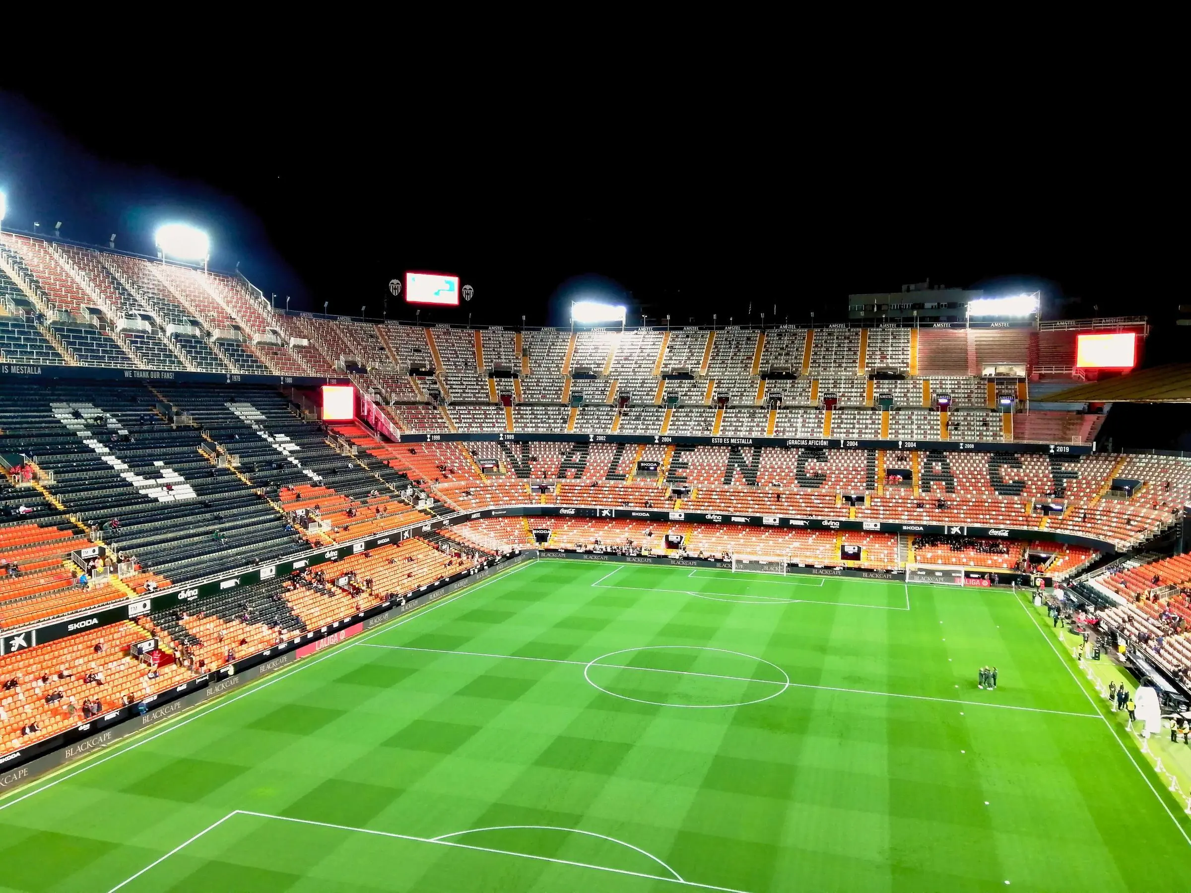 Mestalla Stadium Interior The steep orange and black seating of Mestalla Stadium in Valencia